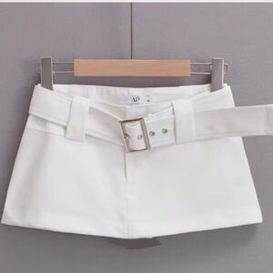 White low rise belted mini skirt